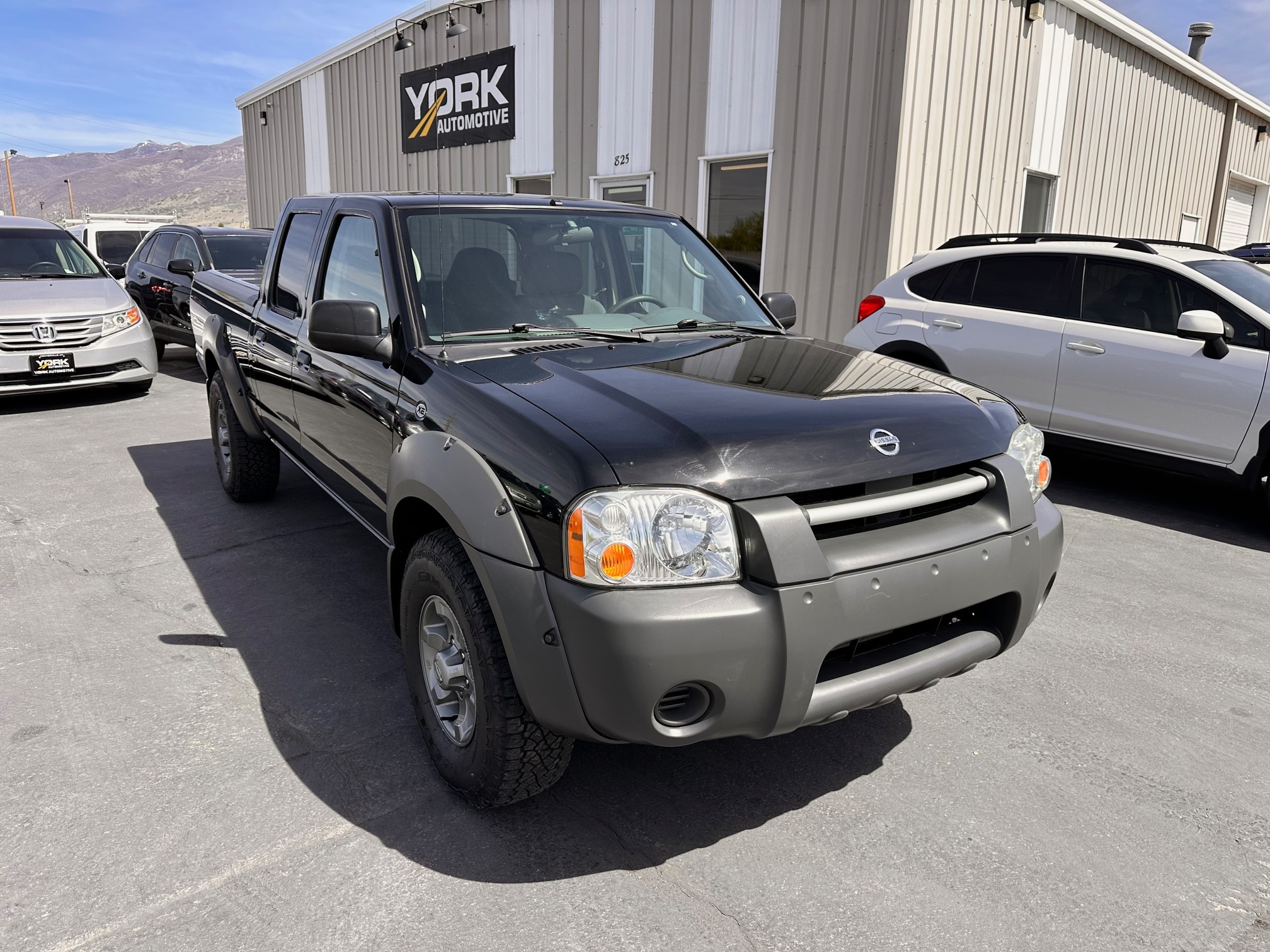 2003 Nissan Frontier XE 4X4 Crew Cab V6 Long Bed AT's photo