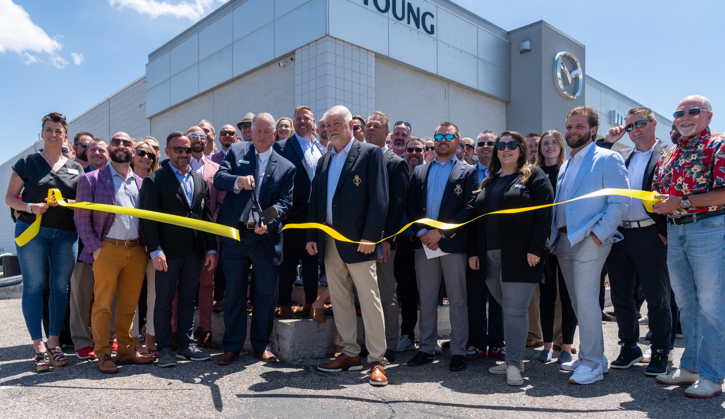  Person cheerfully signing documents.