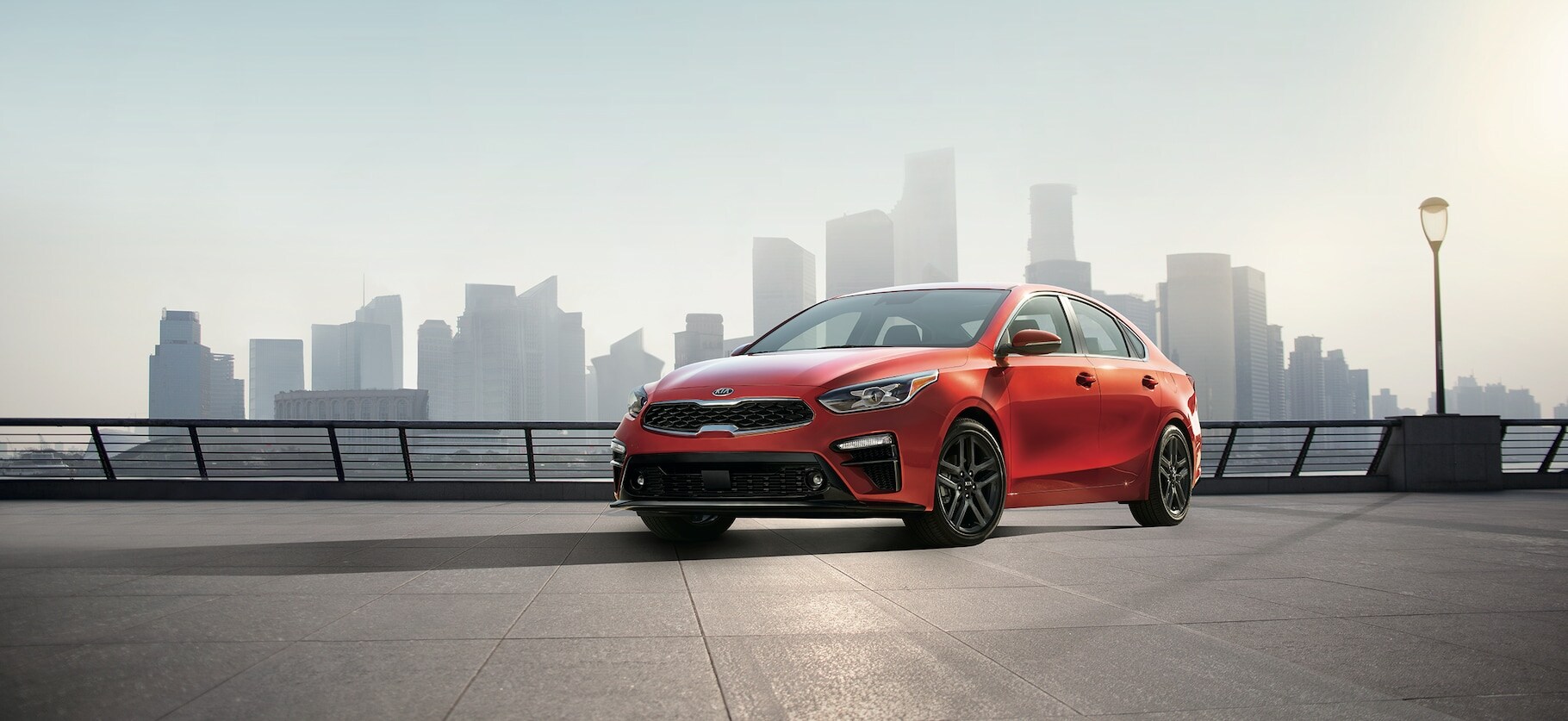 2019 Kia Forte driving on forest road