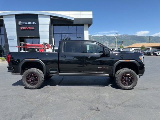 Used 2021 GMC Sierra 3500HD AT4 with VIN 1GT49VEY2MF317395 for sale in Layton, UT