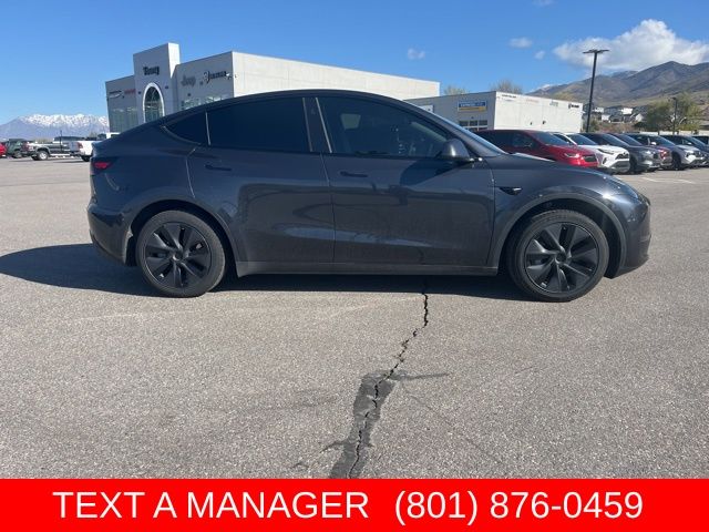 Used 2025 Tesla Model Y Long Range with VIN 7SAYGDED6SF250982 for sale in Morgan, UT