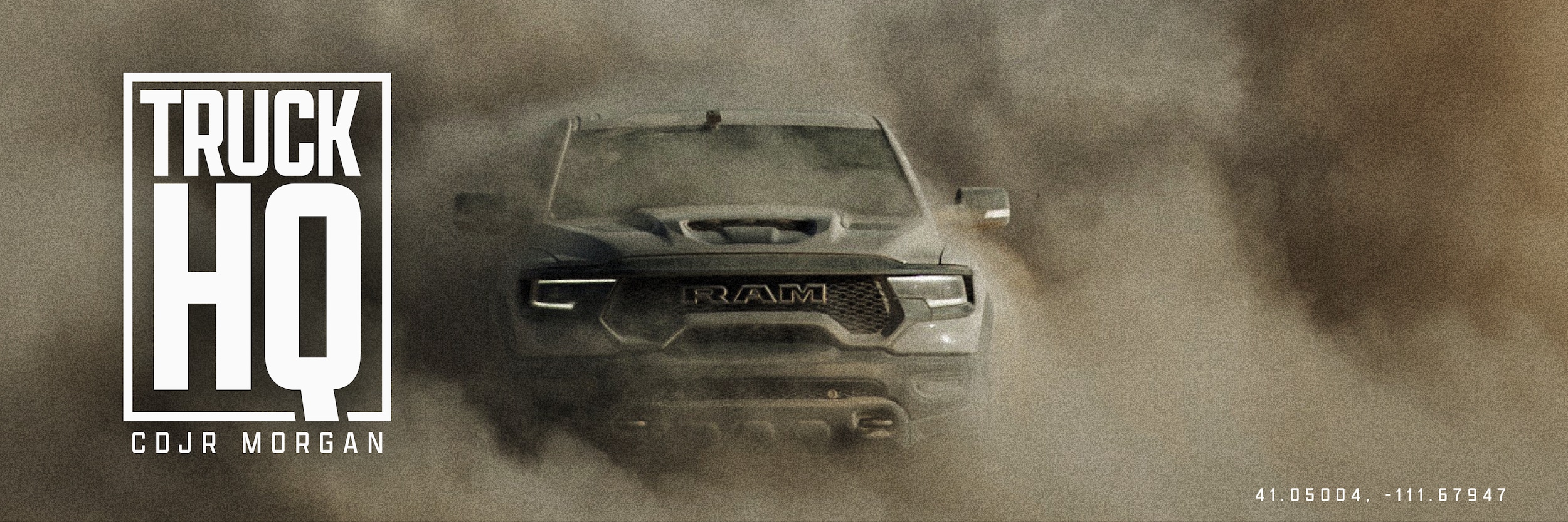 Truck driving through a cloud of desert dust