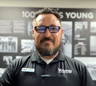 Staff member Justin Hernandez from 119fe7b62ab5