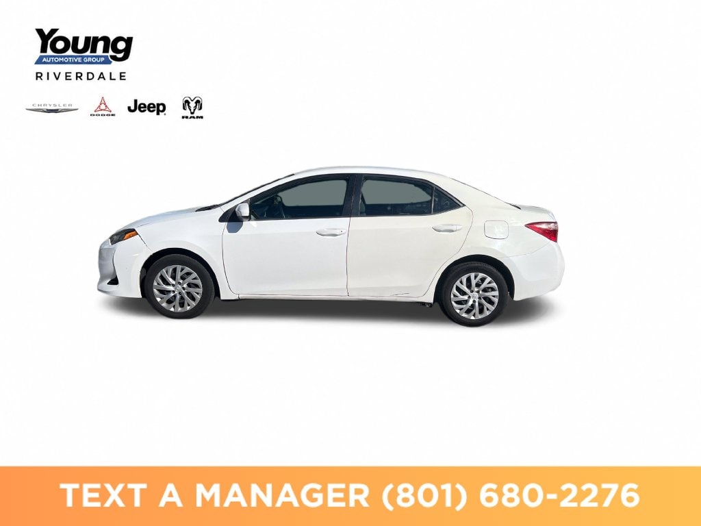Used 2018 Toyota Corolla LE with VIN 5YFBURHE9JP845583 for sale in Riverdale, UT