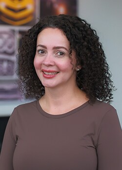Staff member Rosa Poulos from ID_99f9b0ae1268