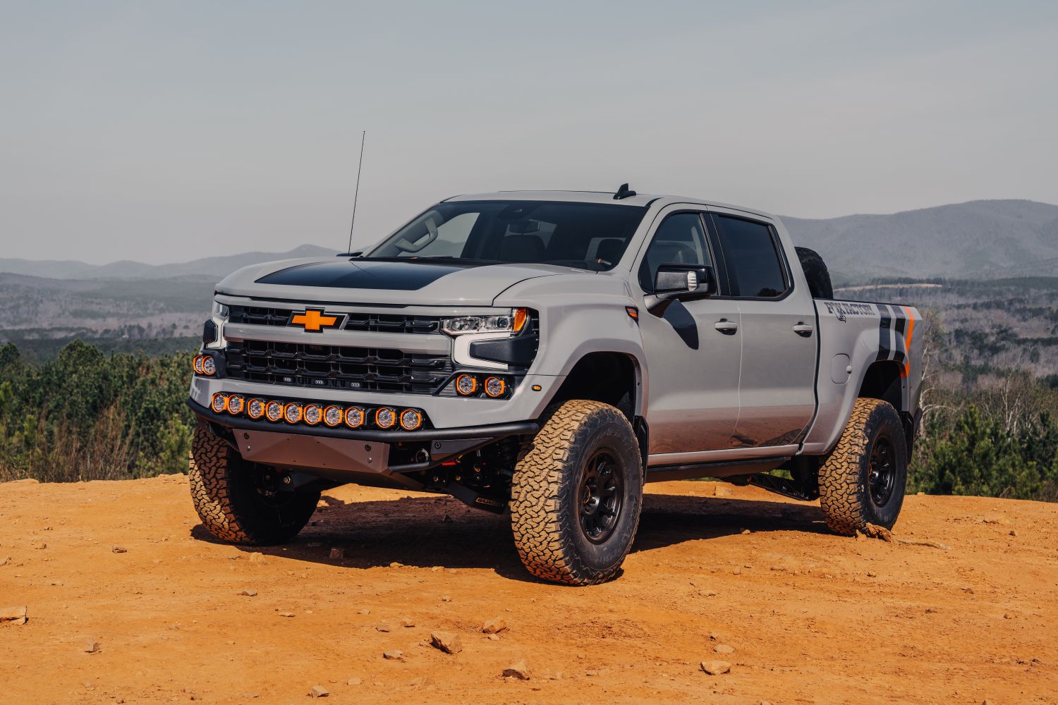 Vented carbon fiber hood, fenders, and bedsides on a Fox Factory Silverado 1500 build