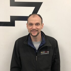 Staff member Adam Hudson from ID_6f14cb769642