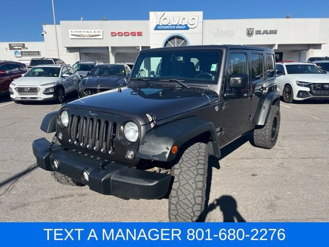 Used 2014 Jeep Wrangler Unlimited Sport with VIN 1C4BJWDG1EL218759 for sale in Layton, UT