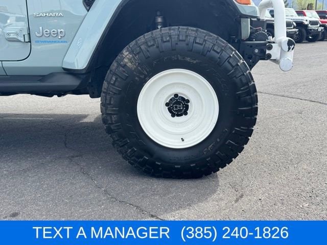 Used 2023 Jeep Wrangler 4xe Sahara 4XE with VIN 1C4JJXP68PW611275 for sale in Layton, UT