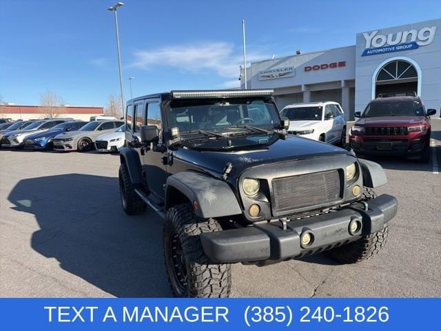 Used 2010 Jeep Wrangler Unlimited Sport with VIN 1J4BA3H11AL135194 for sale in Layton, UT