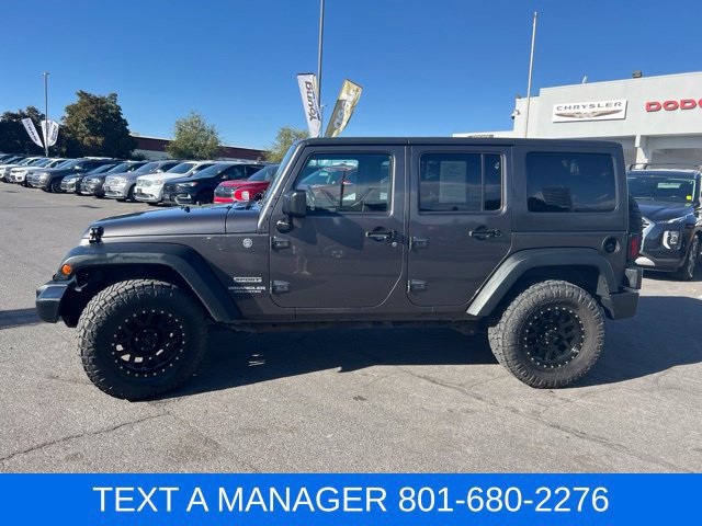 Used 2014 Jeep Wrangler Unlimited Sport with VIN 1C4BJWDG1EL218759 for sale in Layton, UT