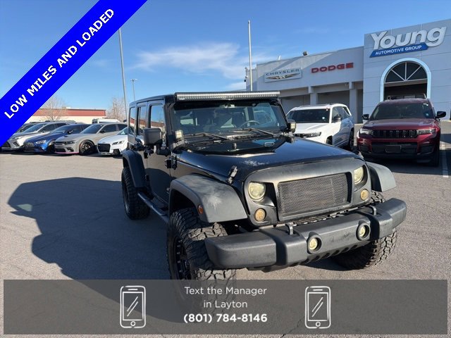 Used 2010 Jeep Wrangler Unlimited Sport with VIN 1J4BA3H11AL135194 for sale in Layton, UT