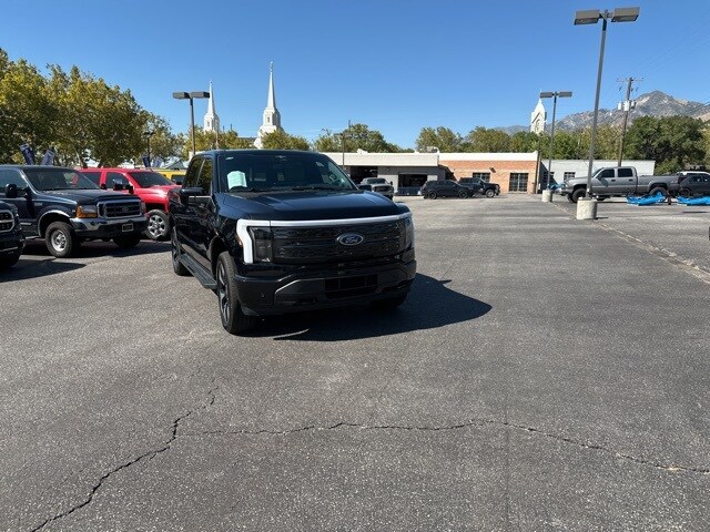 Used 2023 Ford F-150 Lightning Platinum with VIN 1FT6W1EV1PWG14193 for sale in Brigham City, UT