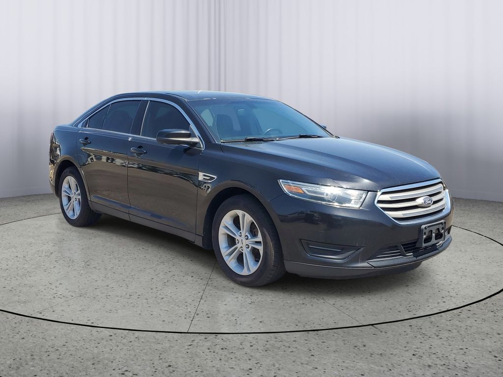 Used 2016 Ford Taurus SEL with VIN 1FAHP2E81GG134919 for sale in Owosso, MI