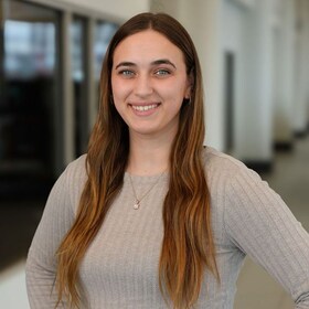 Staff member Savannah Miles  from ID_141aaac165fc