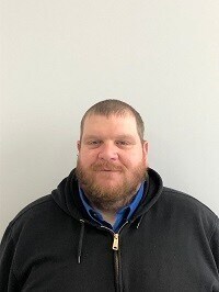 Staff member SCOTT MIILU from ID_87a87f