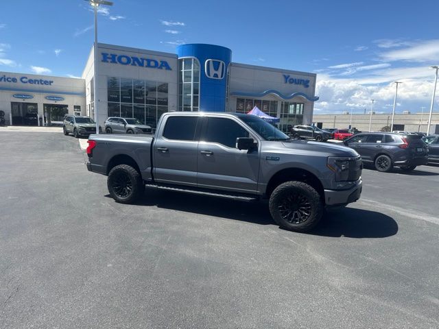 Used 2024 Ford F-150 Lightning XLT with VIN 1FTVW3LK8RWG16171 for sale in North Logan, UT