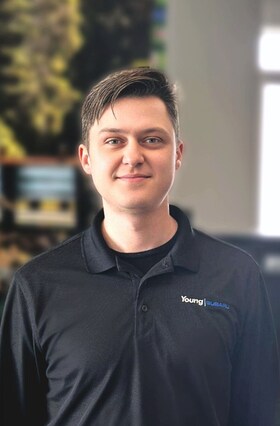 Staff member Samuel Mills from ID_a5d3a1d8195c