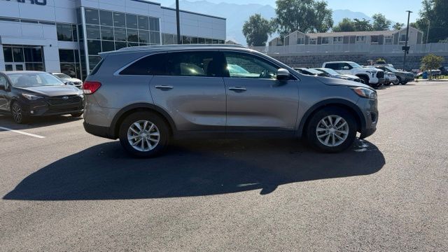 Used 2016 Kia Sorento LX with VIN 5XYPGDA56GG173618 for sale in Ogden, UT