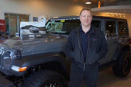 Staff member George Necas from 55ba514324de