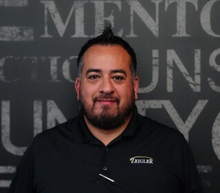 Staff member Alex Sandoval from ID_8c6f0f