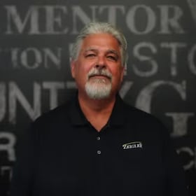 Staff member John Geanakoplos from ID_fc13de