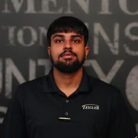 Staff member Hamza Ali from ID_fc13de