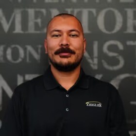 Staff member Tim Umarbaev from ID_fc13de