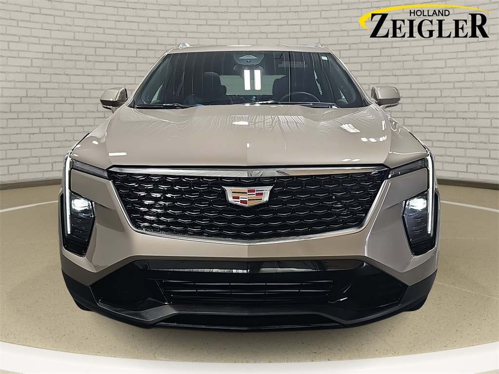 Used 2024 Cadillac XT4 Premium Luxury with VIN 1GYFZDR4XRF244739 for sale in Holland, MI