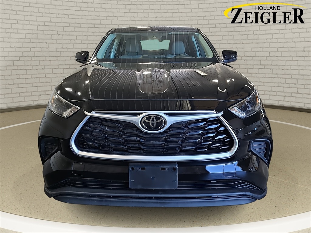 Used 2022 Toyota Highlander L with VIN 5TDCZRBH9NS204665 for sale in Holland, MI
