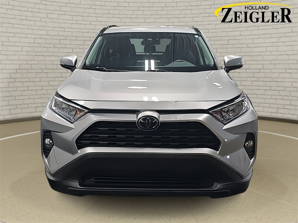 Used 2021 Toyota RAV4 XLE with VIN 2T3P1RFVXMW155627 for sale in Holland, MI