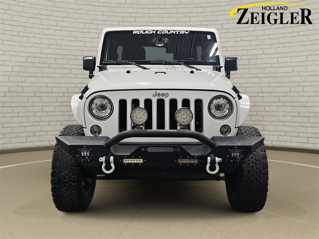 Used 2018 Jeep Wrangler Unlimited Sahara with VIN 1C4BJWEG9JL915203 for sale in Holland, MI