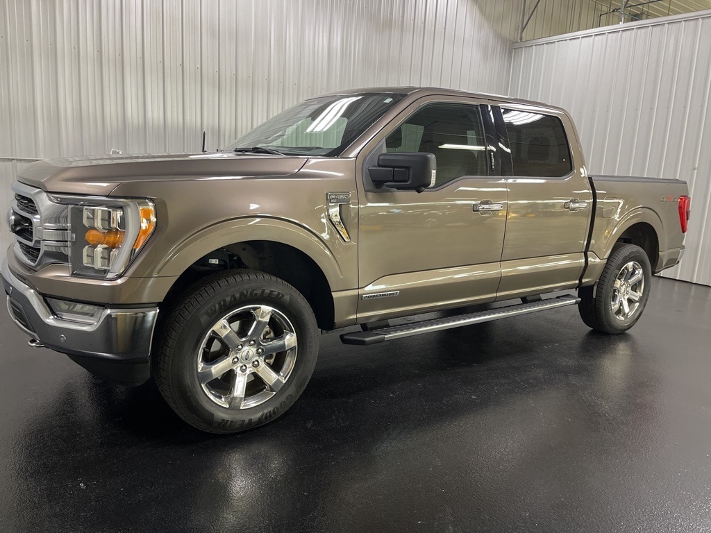 Used 2021 Ford F-150 XLT with VIN 1FTFW1ED8MFD14430 for sale in Holland, MI