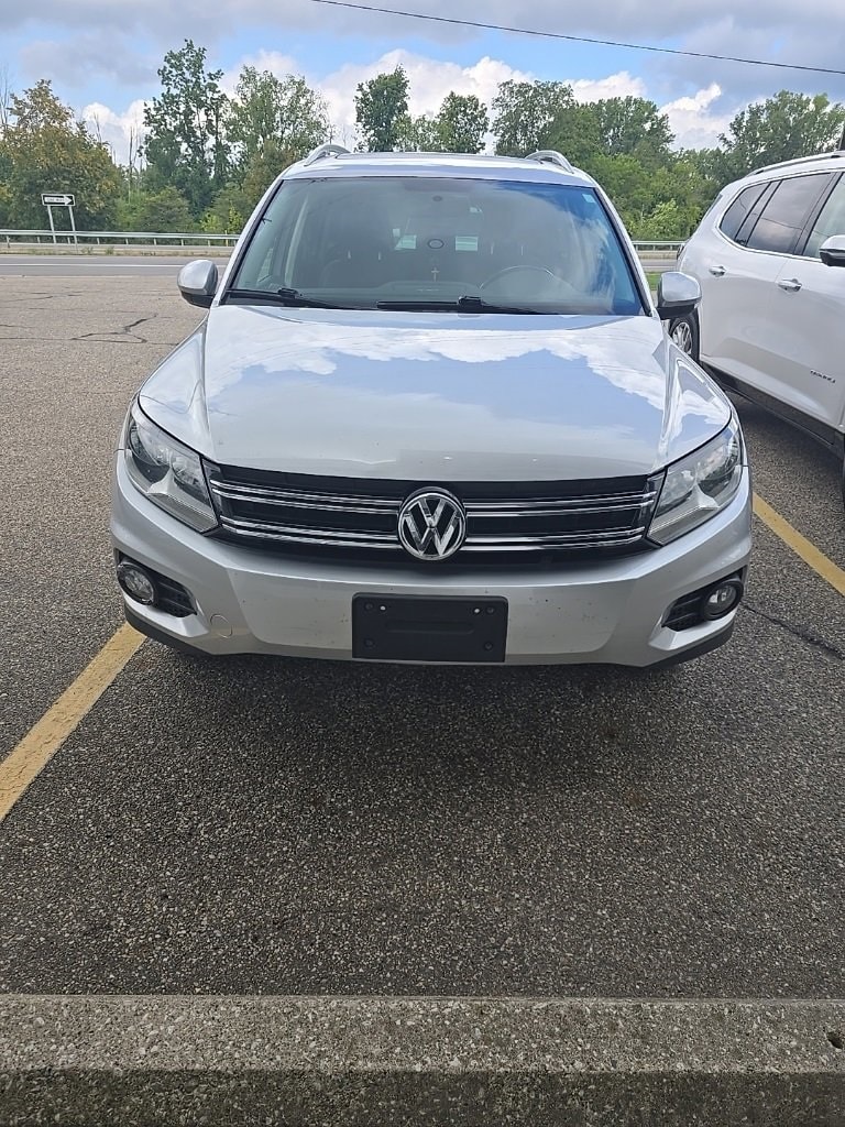 Used 2015 Volkswagen Tiguan SEL with VIN WVGAV7AX0FW513034 for sale in Holland, MI