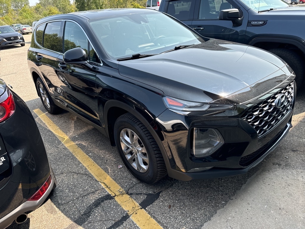 Used 2019 Hyundai Santa Fe SEL with VIN 5NMS3CAD2KH100770 for sale in Holland, MI