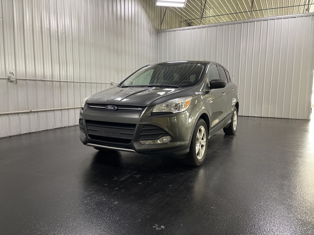 Used 2016 Ford Escape SE with VIN 1FMCU9GXXGUC67248 for sale in Holland, MI