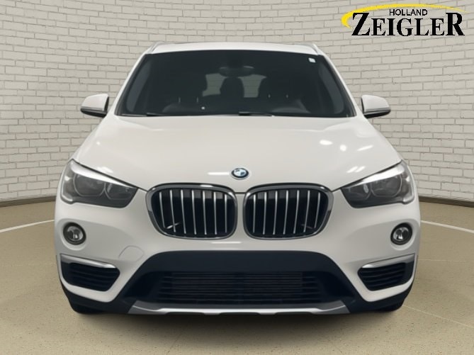 Used 2018 BMW X1 28i with VIN WBXHT3C35J5K24275 for sale in Holland, MI