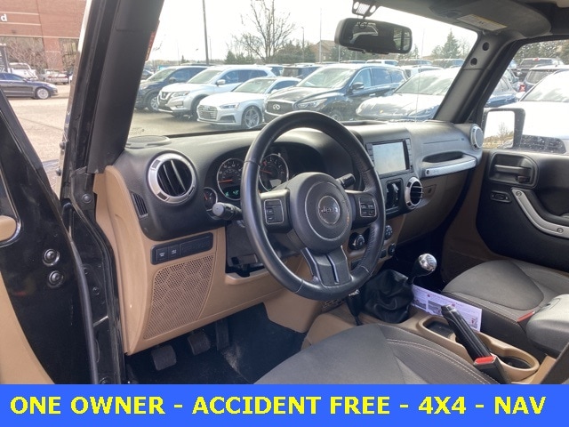 Used 2015 Jeep Wrangler Unlimited Rubicon with VIN 1C4BJWFG3FL664457 for sale in Grandville, MI