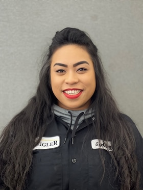 Staff member Sydney Ziko from 7081cb6e5afa