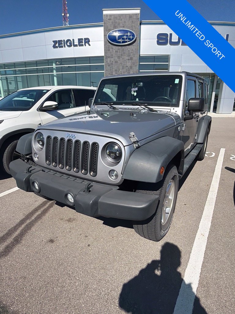 Used 2014 Jeep Wrangler Unlimited Sport with VIN 1C4BJWDG0EL170851 for sale in Kalamazoo, MI