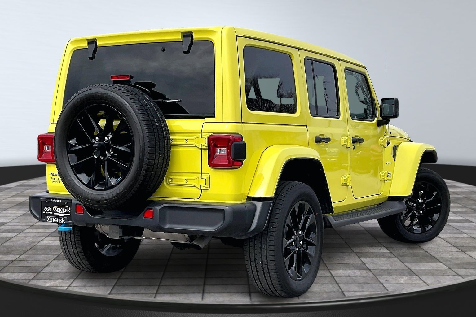 Used 2022 Jeep Wrangler Unlimited Sahara 4XE with VIN 1C4JJXP69NW206183 for sale in Lafayette, IN