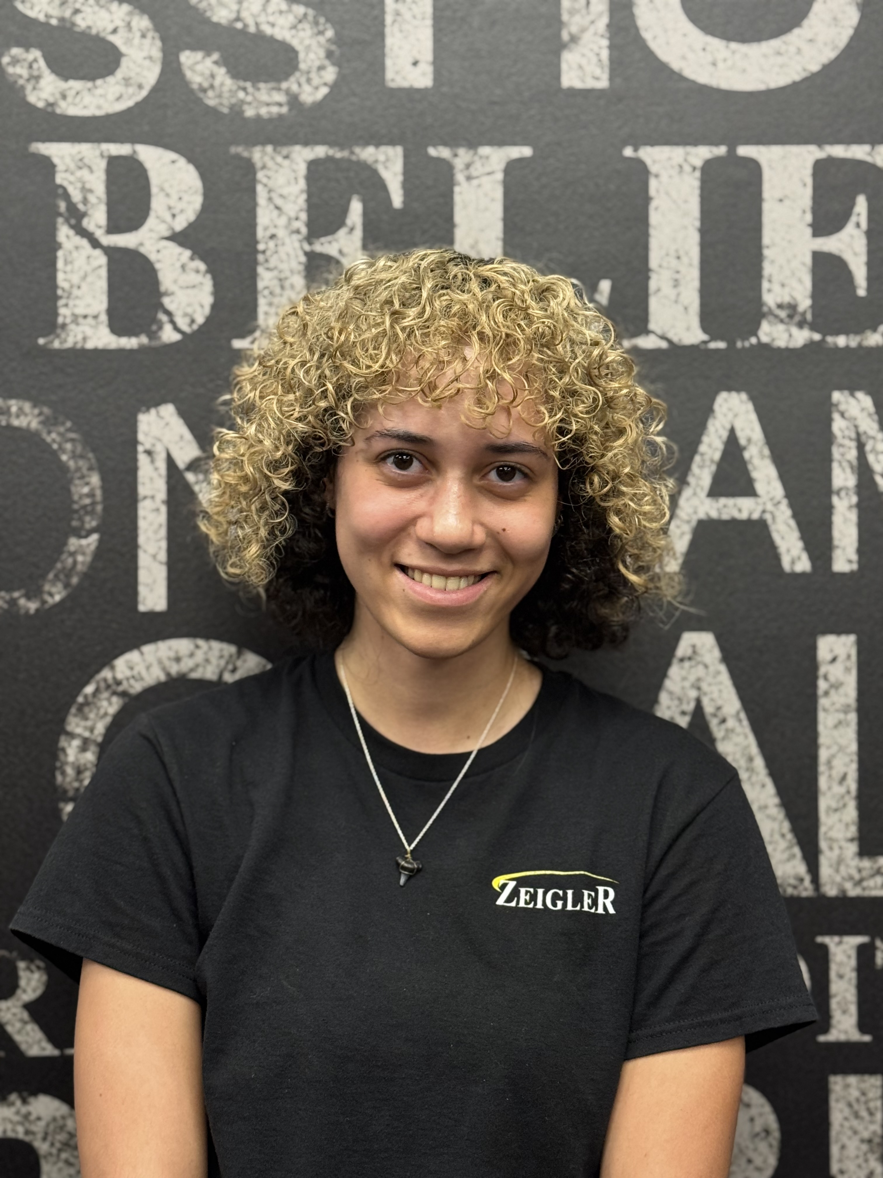 Staff member Sydney Almasy from ID_1b8c746a6952