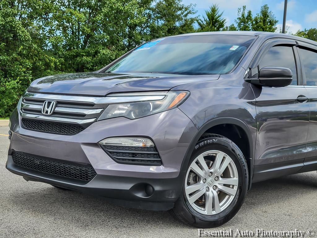 Used 2016 Honda Pilot LX with VIN 5FNYF6H18GB082296 for sale in Crown Point, IN