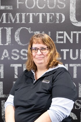 Staff member Ginger Popovich from 2711e499f1c9