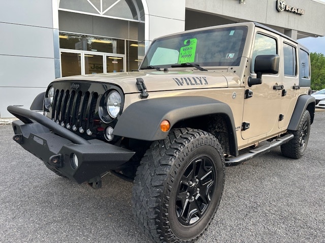 Certified 2016 Jeep Wrangler Unlimited Willys Wheeler with VIN 1C4BJWDG1GL270590 for sale in Sunbury, PA