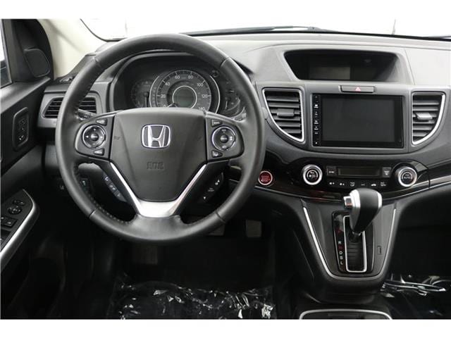 Used 2016 Honda CR-V Touring with VIN 5J6RM4H95GL117856 for sale in Beatrice, NE