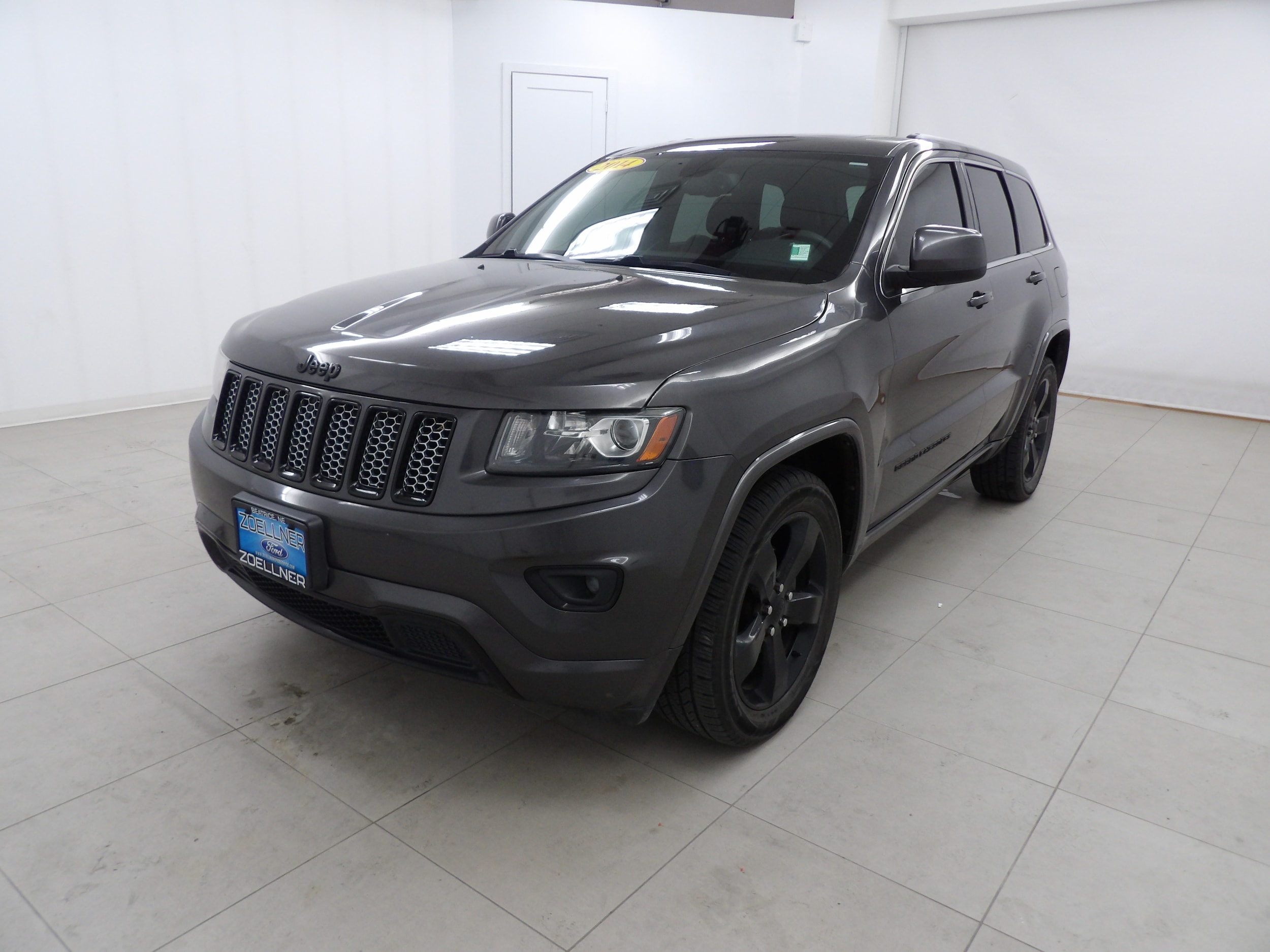 Used 2014 Jeep Grand Cherokee Altitude with VIN 1C4RJFAGXEC547219 for sale in Beatrice, NE