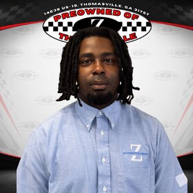 Staff member Travis Hunter from a2262a6d5043