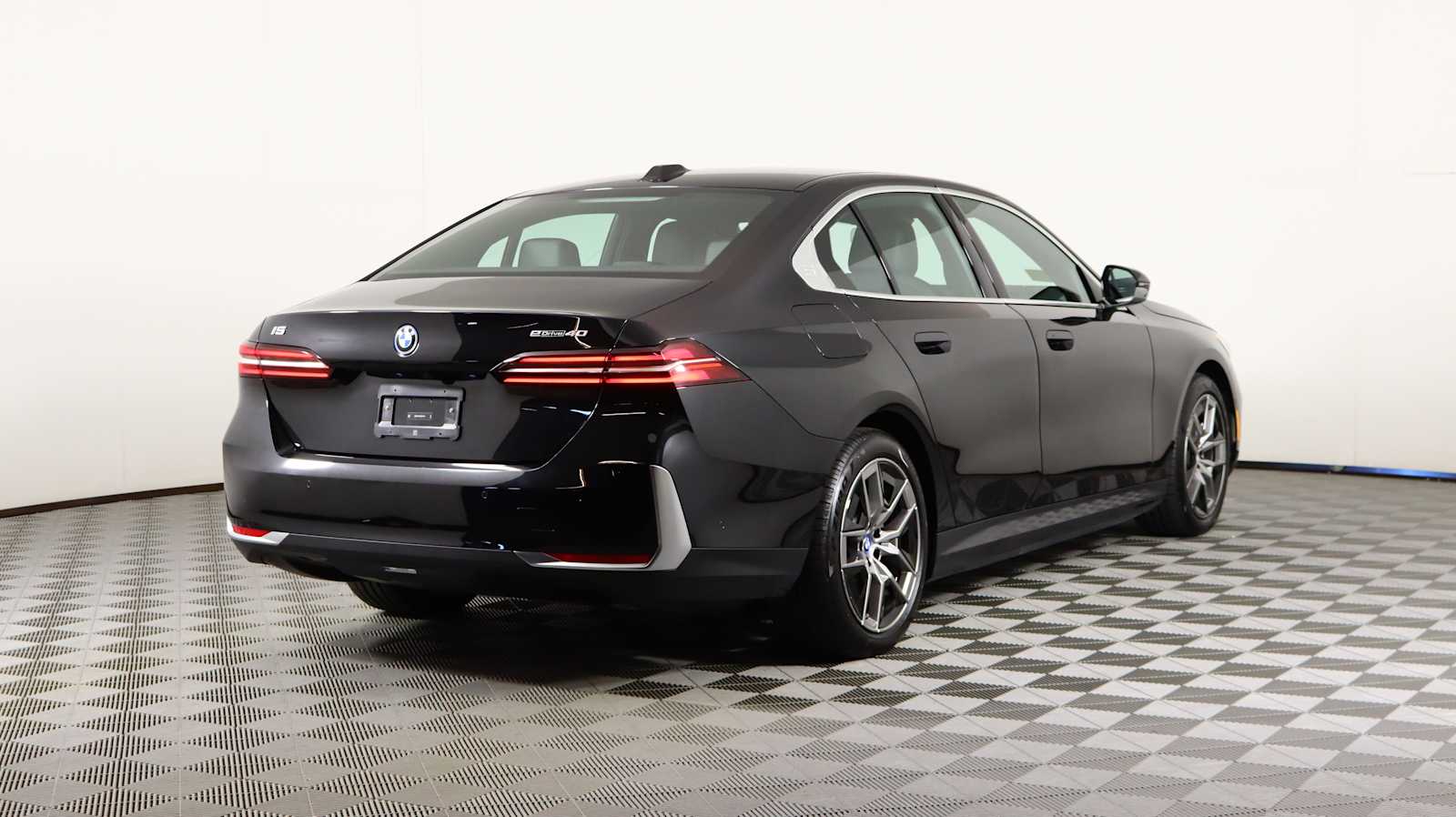 used 2024 BMW i5 car, priced at $45,977