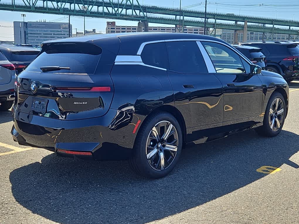 new 2026 BMW iX car, priced at $96,670